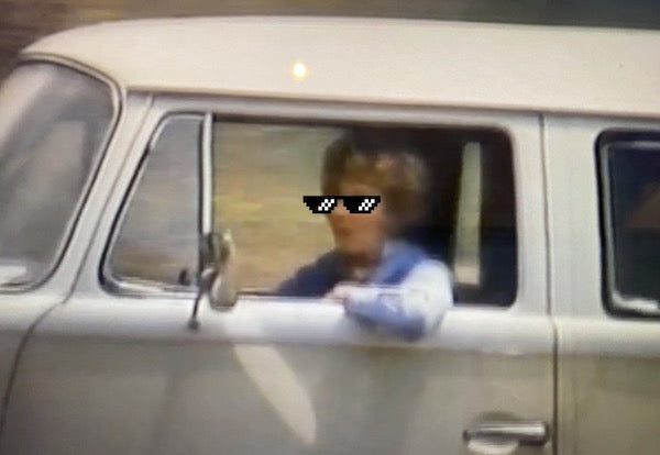 author Marguerite Henry driving a VW Van wearing sunglasses; Marguerite Henry biography